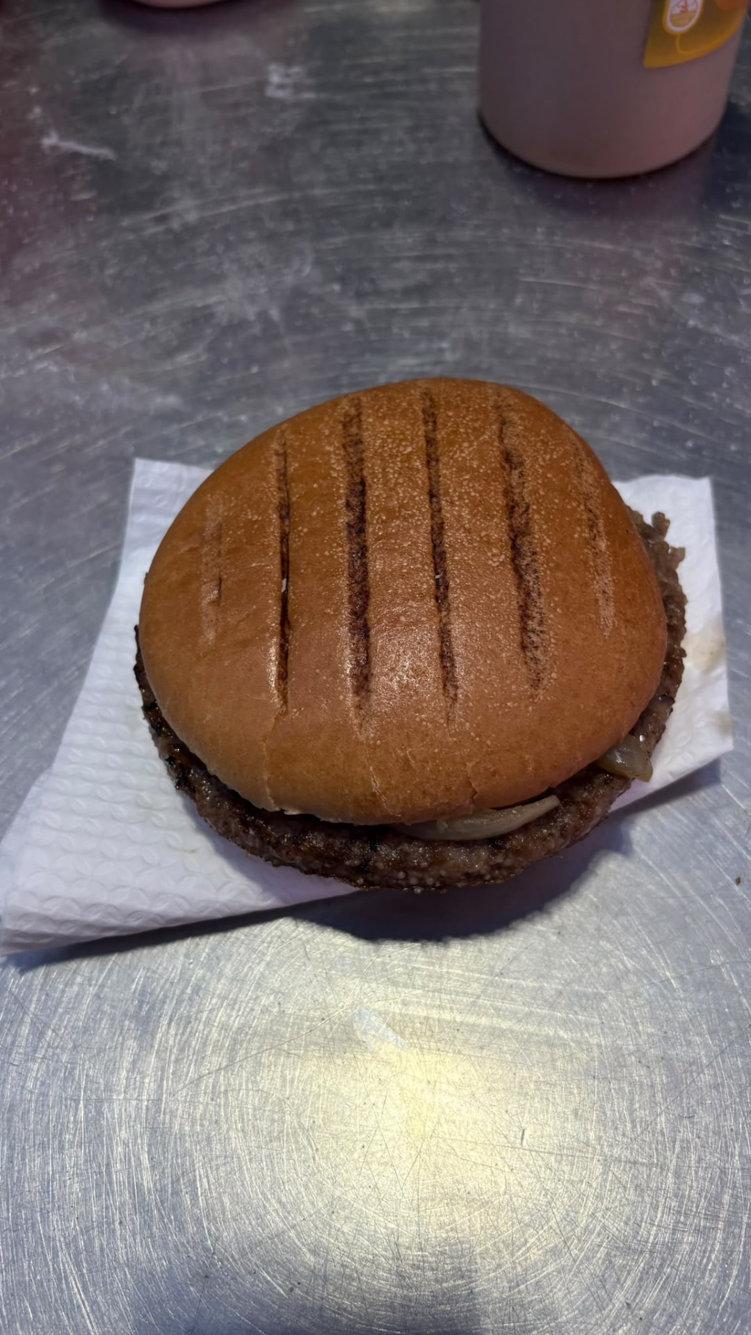 The Boreham Wood quarter pounder closed, with grill marks on the bun