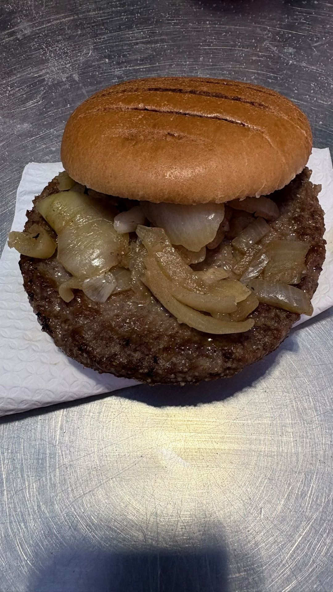 Boreham Wood's £6.00 quarter pounder opened to show the griddled onions