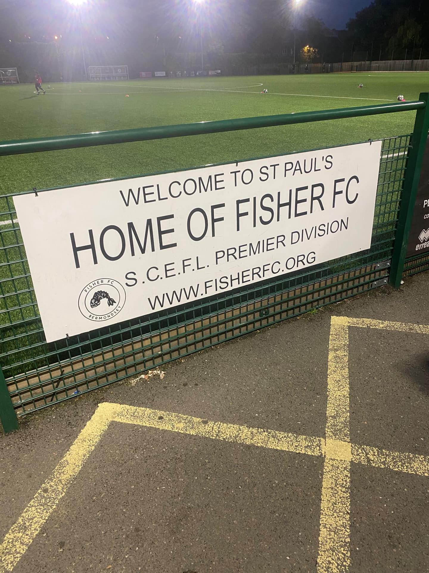 Welcome to St Paul's, home of Fisher FC, sign beside the pitch